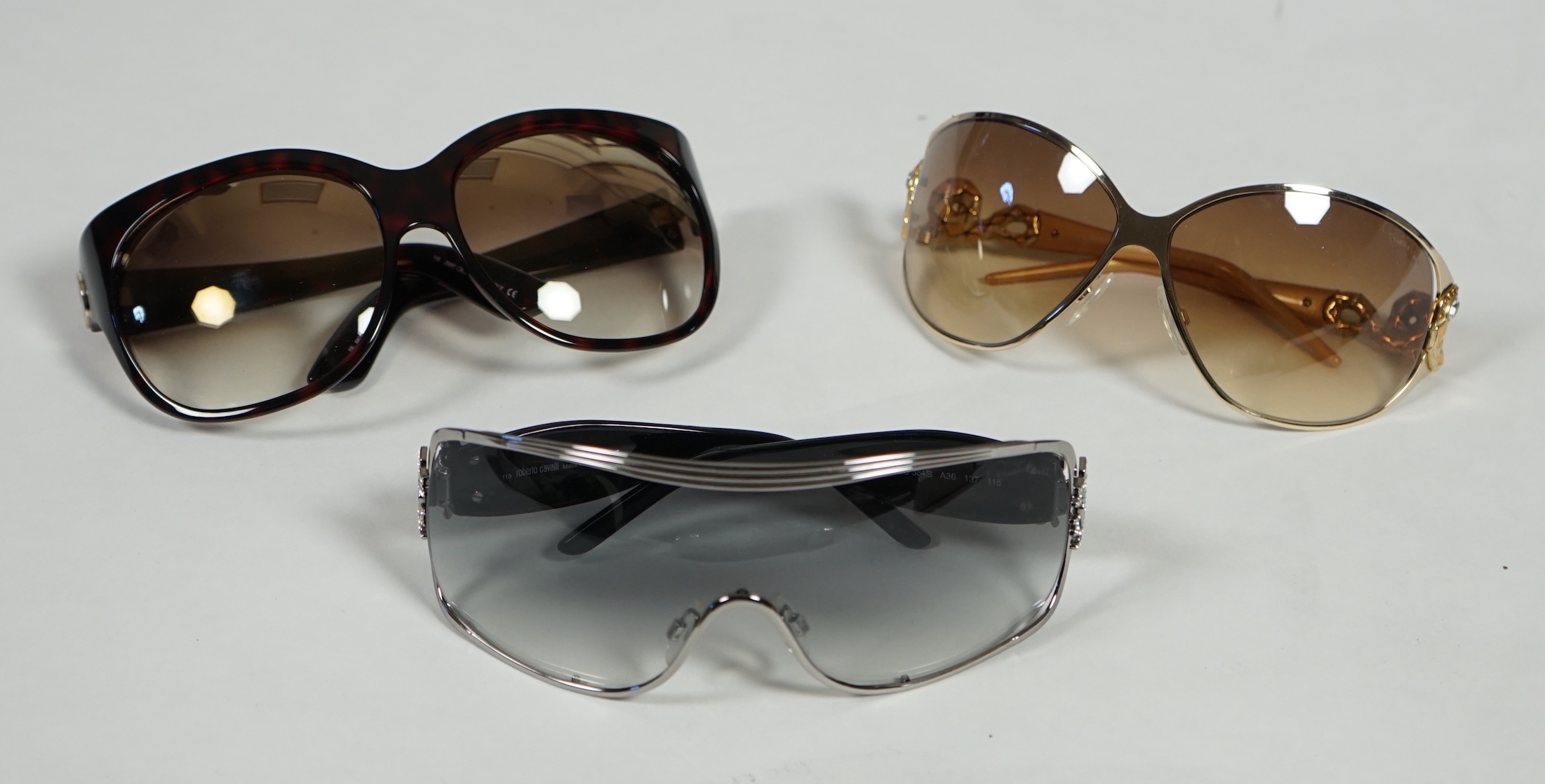 Two pairs of Roberto Cavalli and one pair of Jimmy Choo lady's sunglasses